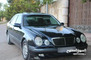  10 E200. 2002  قرش ونص 2002  رقم الهاتف بالوصف