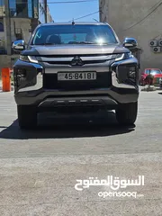  2 Mitsubishi L200 Sportero