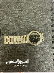  10 espec ساعة فضية كوارتز ستانلس ستيل ضد الماء صنع في الصين سير على شكل صدفات بحرية الداخل أسود