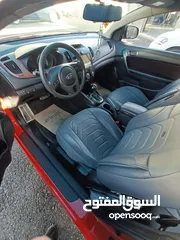  5 كيا فورتي 2011 فحص 2 جيد امامي كراسي مدفية،كوندشن،تحكم طارة،مري كهرباء كاميرا خلفية وشاشة نظام خرائط