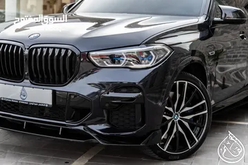  13 BMW X5 2023  M kit Plug in hybrid   السيارة وارد و كفالة الشركة و قطعت مسافة 18,000 كم فقط