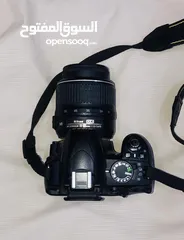  1 كاميرا نيكـون 3100D + قطـعه تحويل وكامل ملـحقاتـها وياها زوم 55-18