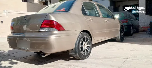  7 ميتسوبيشي لانسر 2003 أوتوماتيك