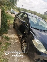  1 نيسان تيدا  موديل 2006 خالي قص قلبان  السياره اقتصاديه وانظيفه