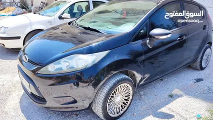  1 فورد فيستا 2012 جنط مغنيسيوم دهان شركة شاشة انرويد