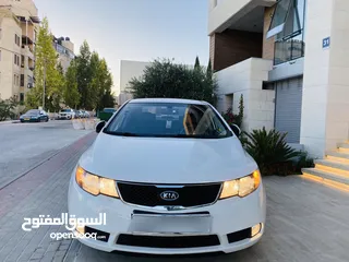  5 كيا فورتي فل اضافات 2009  بحالة فوق الممتازة الله يبارك لصاحب النصيب ..