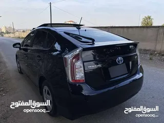  20 تويوتا بريوس 2015 هايبرد فل كامل مع بانوراما أعلى صنف بكج ( 5) لون اسود مميز