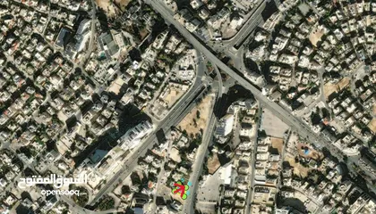  1 قطعة ارض تجاري للبيع في العبدلي موقع مميزعلى ثلاث شوارع وقريبة من المستشفى الاسلامي