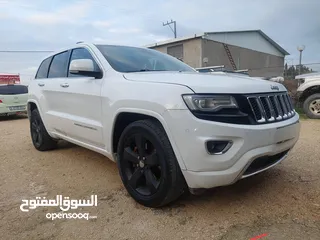  2 جيب جراند شيروكي موديل 2014اوفر لاند فحص نظيف من جميعو