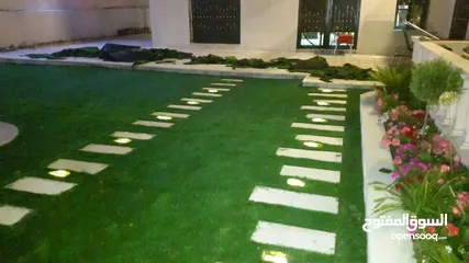  18 عشب صناعي (ترتان) وأشجار و ورد صناعي