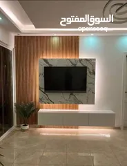 21 ورق جدران والشيبورد وبانوهات وجبسن بورد وبانوهات والدهان وبديل الخشب وبديل الحجر والقرميد والفاير بل