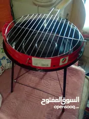  1 CHARCOAL GRILL