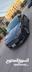  2 فورد فيوجن 2015 اعلى صنف تيتانيوم اصلي  بدون فتحه فحص كامل 7جيد