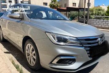  11 سيارة MG 5، لون سلڤر، فحص كامل، وارد الشركة، كفالة الشركة، بنزين اقتصادية جدا