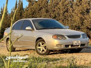  1 للبيع  كيا سبكترا 2002 - نظافة مميزة وسعر ممتاز سيارة اقتصادية ومريحة