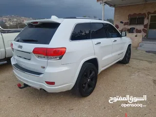  2 جيب جراند شيروكي اوفر لاند 2014 ترخيص 13 فحص نظيف من جميعو