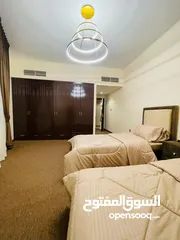 23 Two rooms and a hall for monthly rent in Ajman, overlooking the creek, new furnishings, Al Rashidiya