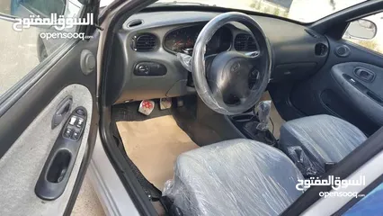  6 هونداي افانتي لون سلفر 97 فحص اربعه جيد أمامي جيد قصعات وخلفي جيدات