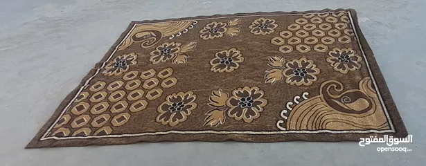  4 سجادة لون بني قياس 2*2.5 كما هو موضح في الصورة