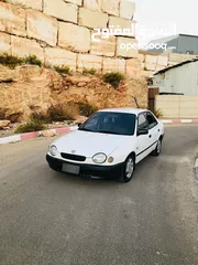  1 تويوتا كورولا مديل 99 جير تومات  متور 1.6  فحص ممتاز
