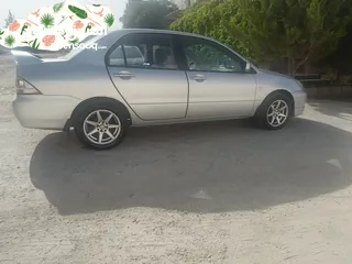  14 ميتسوبيشي لانسر 2009 للبيع Mitsubishi lancer 2009
