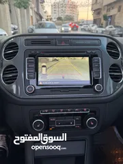  14 فوكس فاجن تيجوان 2012 بنزين متور 2000 تيربو 4x4 فتحة سقف بانوراما فرش بني مميز عداد قليل فحص ممتاز