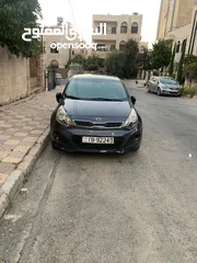  4 Kia Rio 2014 هاتشباك مجنط مع فتحة