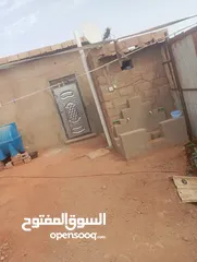  11 منزل في أم درمان الحاره 67 الأم مساحته 130 متر يفتح في ميدان فيهو سور خارجي متصل بالبيت 3 غرف وصالون