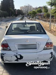  4 ميتسوبيشي لانسر 2006 للبيع حبة نادرة