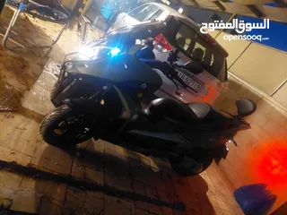  9 دراجة سكوتر كوادرو ثلاثية العجلات صناعة سويسرية محرك 350cc موديل 2019