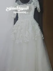  2 فستان زفاف للبيع بسعر معقول