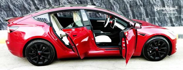 30 تيسلا 2022 model 3 فحص كامل 4 جــيـــد بدون ملاحظات غرفة جلد ابيض لون مميز بحالة الوكالة بسعر لقطة