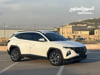  1 هونداي توسان /2022 فل الفل بدون فتحة سقف  2x4 ///240Hp بنزين + كهرباء  ( Haybrid) 1600cc