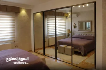  10 شقة مع روف دوبلكس للبيع في حي الصحابة - ref: 14581