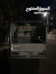  8 كيا بنجو لون ابيض 2003