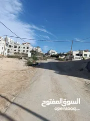  2 قطعة ارض بالقرب من جامع الزاوياني على شارع 12 متر