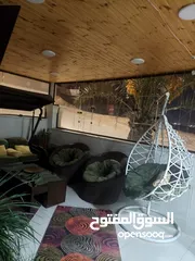 14 شقه ارضيه بشارع الاردن حي المنصور 176متر داخلي وخارجي 100
