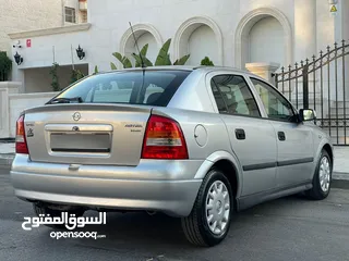  5 ‎أوبل استرا موديل 2001  وارد الوكالة ومالك واحد فقط من الشركة عداد 100الف كيلو فقط