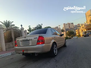  4 مازدا 323 اتماتك فتحه اصليه تحفه بمعنا الكلمه بسعر حرق 29500 ألف نقدا بدل وارد فحص نخب