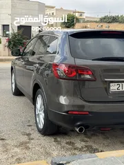  1 جيب مازدا CX-9  2015 ترخيص واطي ، دفع رباعي فحص كامل فل كامل 7 مقاعد ، بحالة ممتازة جدا .