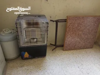 2 طاوله بحالة الوكاله وصوبة غاز شغاله وكيزر غير معروف عطله للبيع