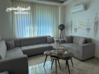  2 غرفة جلوس تفصيل مرتبها مه طاولات