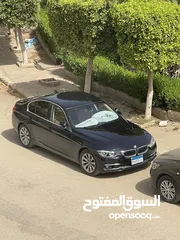 2 BMW 318i Luxury