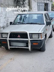  1 ميتسوبيشي l200 موديل 1997 2*4 هوك خلفي