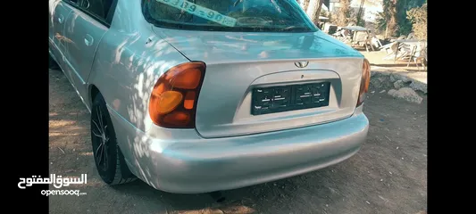  5 سيارة دايو لانوس موضيل 2002 موتور 1600 السيارة لعبة بالنايلون منفولة جديد مش ناقصها غير الصلاة ع نبي