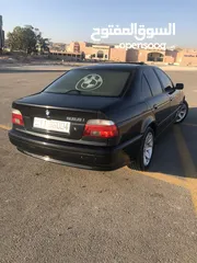  7 BMW 523i e39 الدب