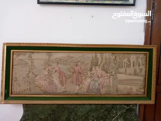  1 لوحات  رسم زيتي.. وتطريز