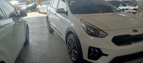 2 كيا نيرو 2021 جمرك جديد وارد كوري ممشي 32  الف فحص كامل جنطات تورنج