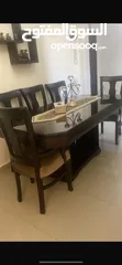  1 طتولة سفرة 6 كراسي  + قنصل بحالة ممتازه