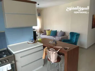  12 شقه للبيع عين منجد مقابل قياده الشرطة
